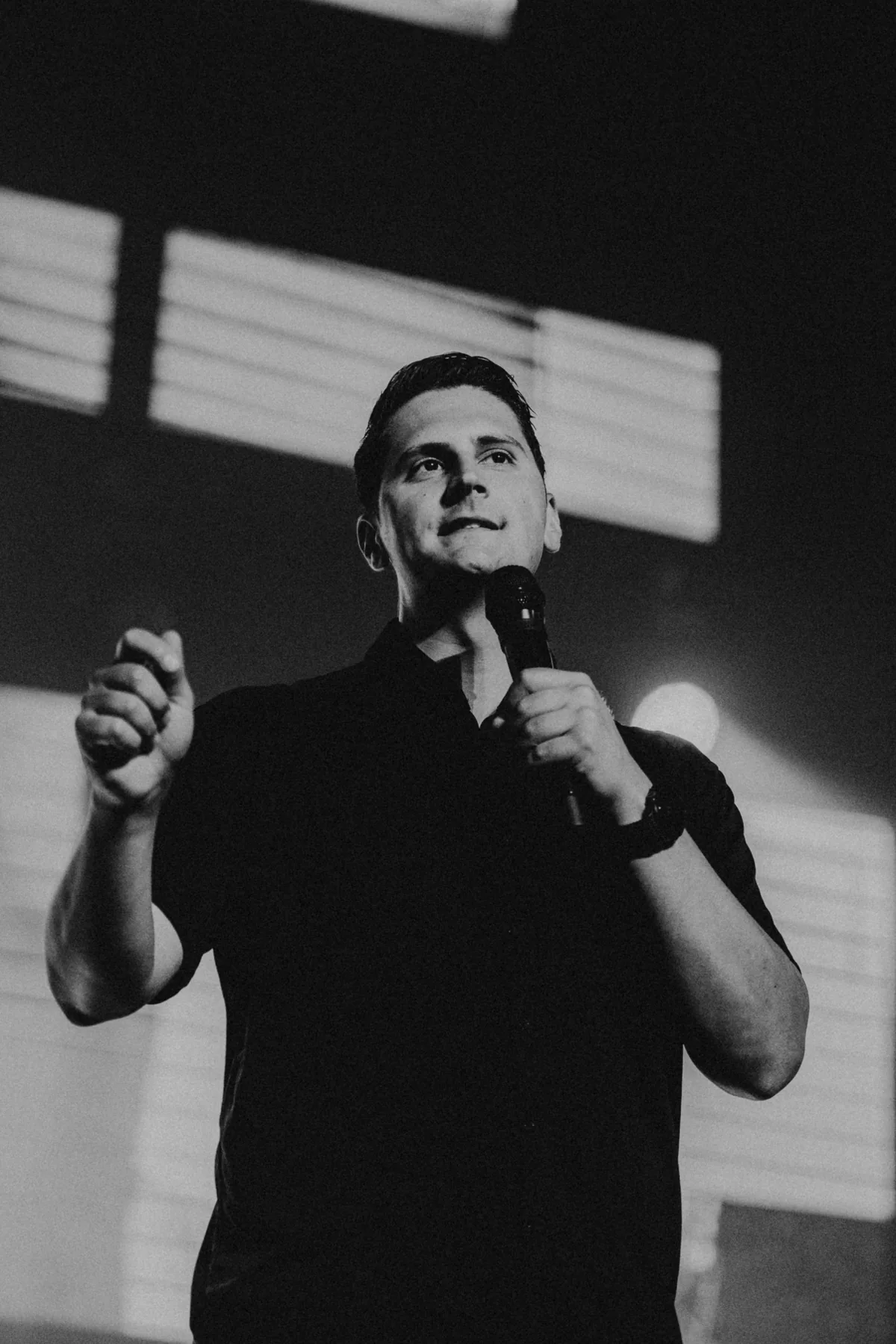 Carlo Orlando speaking with a microphone